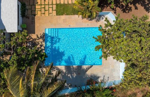 Vaijanath Villa | StayVista's Santoni Farms - Riverside Bliss with Pool, Orchard & Activities