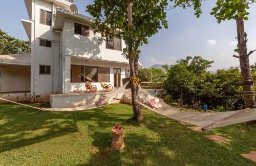 Vaijanath Villa | StayVista's Santoni Farms - Riverside Bliss with Pool, Orchard & Activities