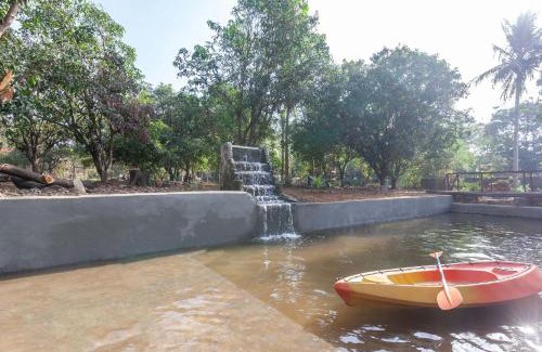 Vaijanath Villa | StayVista's Santoni Farms - Riverside Bliss with Pool, Orchard & Activities