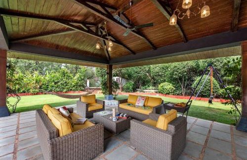 Kune N.m. Villa | StayVista's Woodstone Villa - Mountain Retreat with Heated Pool & Activities