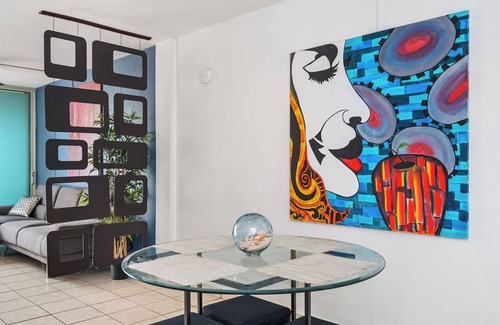 Condado Apartment | Steps to Condado Beach! Relax by the pool with free parking & all modern comforts