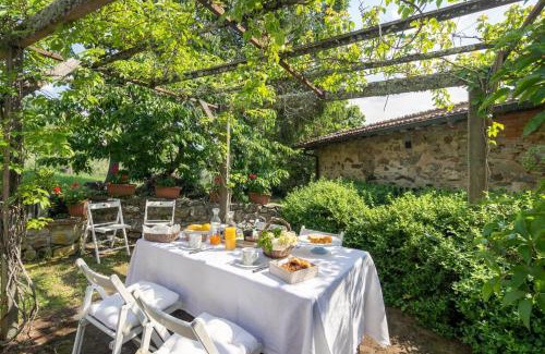 Lamole Villa | Stone built farmhouse Antica Torre by VacaVilla