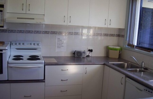 Port Macquarie Apartment | STRATHMORE LODGE UNIT 1. UPPER LEVEL. Spectacular views of Lighthouse Beach.