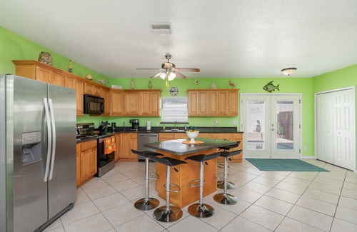 Port Canaveral House | Stunning Beach Home with Heated Pool, 200+ 5 star Reviews, Easy Beach Access!