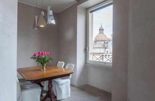 Rione XI Sant'Angelo Apartment | Stunning views over central Rome's rooftops - FromHometoRome