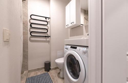 Vilnius Apartment | Stylich white salad studio near the city center