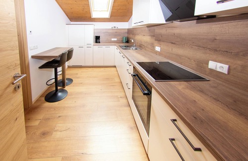 Valle San Silvestro Apartment | Stylish alpine apartment with tiled stove, sauna & panoramic view