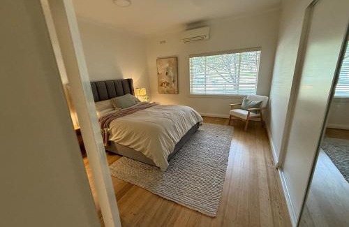 East Melbourne Apartment | Stylish Comfort on the Park