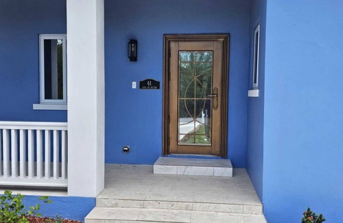 Nicholls Town House | Stylish modern home with all amenities in quiet neighbourhood. Sleeps four.