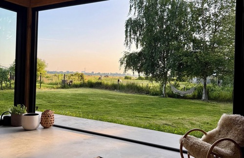 Landsmeer Villa | Stylish waterfront villa with luxurious private wellness, 5 min. From Amsterdam