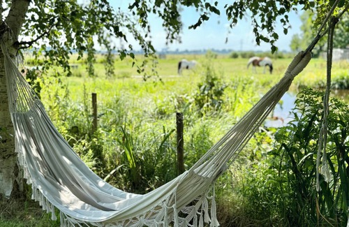 Landsmeer Villa | Stylish waterfront villa with luxurious private wellness, 5 min. From Amsterdam