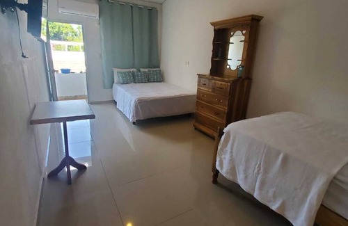 San Diego Cabin | Suite Steps away from the beach AC free Fiber int in Playa San Diego La Libertad