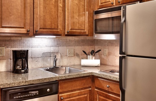 West Omaha Condo | Suite with Pool | Business Essentials