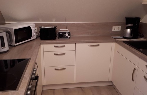 Neermoor Apartment | Sunny apartment with balcony and pond view