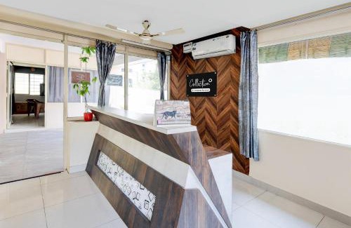 Kakinada Hotel | Super Collection O Bhanugudi Junction Kakinada Formerly Stay Inn Luxury