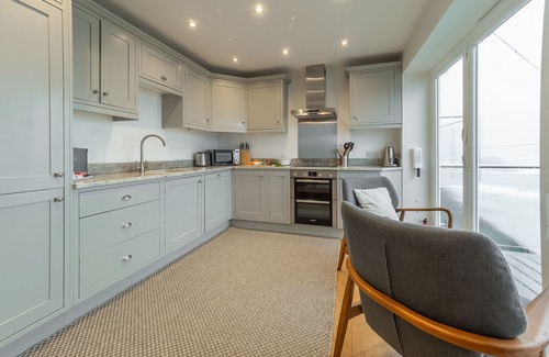 Portreath House | Superbly appointed accommodation, and a soothing hot tub on the decked balcony.