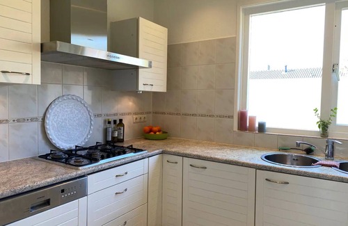 Berkhout House | Sweet little home on the water with a fireplace