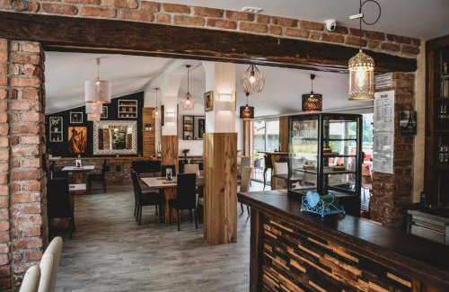 Dravograd House | Ta Fabrika Restavracija,pizzerija in prenočišča