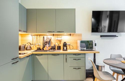 Quartier de Rochechouart Apartment | Taste of Paris near Montmartre Sacre Coeur