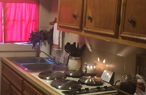 Buchanan Dam Cabin | Texas Lake cabin , private hot tub , Pool & kayaks shared . out door kitchen