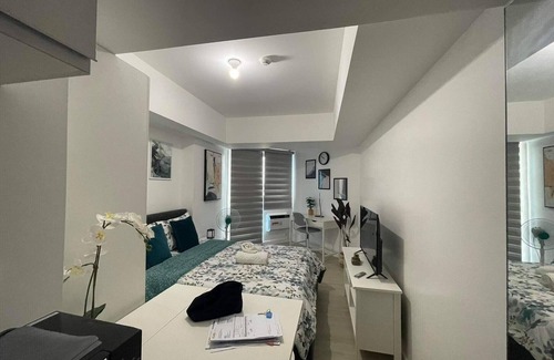 San Fernando Condo | The Comfy Loft at Azure North
