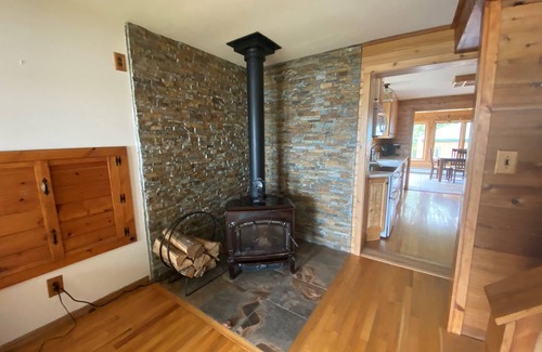 Big Bay House | "The Dam House" Lake and River Front Home with Beautiful Sunset Views