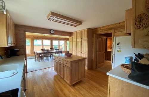 Big Bay House | "The Dam House" Lake and River Front Home with Beautiful Sunset Views