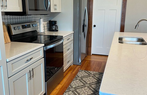 Cascade House | The Falls Inn-A renovated 2-story 3 bedroom house next to river in Cascade, IA