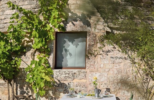 Ostuni Villa | The Guardian, refined trullo with pool surrounded by nature