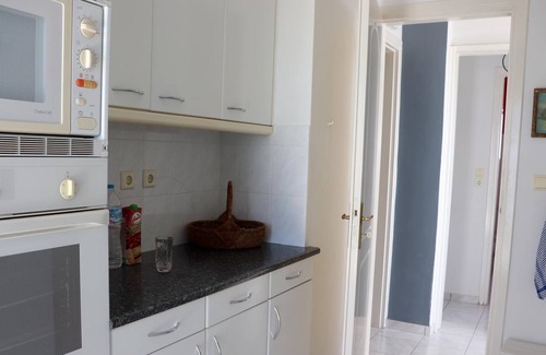 Saronida Apartment | The holiday apartment is in a beautiful and quiet hillside location close to the