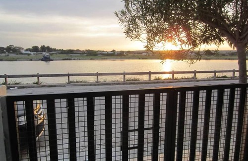 Torre San Giovanni House | The 'House Basin' with garden and pergola behind