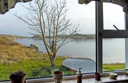 Wild Atlantic Way Cottage | THE LAKE HOUSE, CONNEMARA in Lettermullen, County Galway