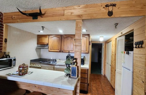 River Ranch Condo | The Old West Rustic Cabin at River Ranch Resort! 103