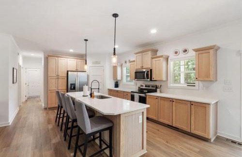 Carthage House | The Porch and Pines Cottage