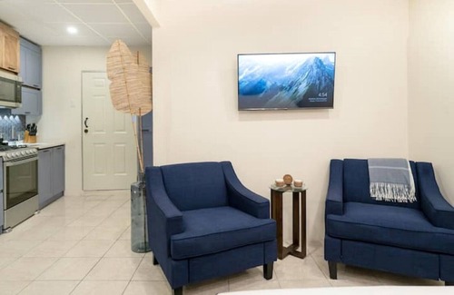 Trincity Villa | The Sanctuary: Studio near Airport with fire place