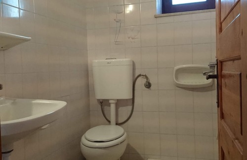 Mithimna House | The Schoolmistress With the Golden Eyes