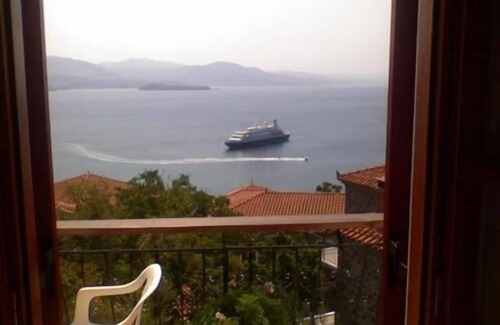 Mithimna House | The Schoolmistress With the Golden Eyes