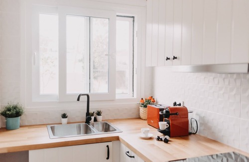 Pelekito House | The SummerHouse Project, a Home with Garden & Veranda, 5' from the Beach