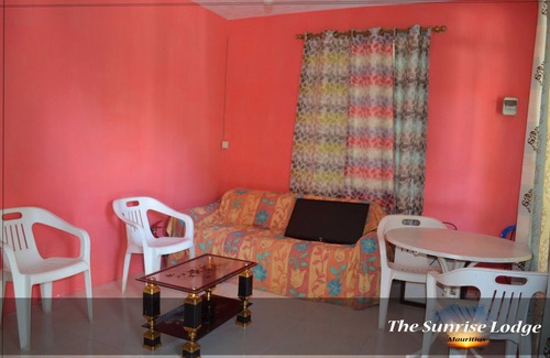 Centre de Flacq House | The Sunrise Lodge is only 8 Minutes Walking Distance To Belle-Mare Plage.