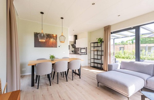 Kotten House | This holiday home for 6 people has a spacious living room with an open kitchen, three bedrooms, and a spacious terrace.