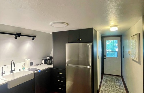 Browns Lake Cabin | This modern A-Frame home promises a sanctuary of comfort and tranquility.