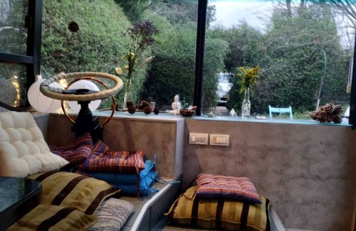 Savyon House | This public bus was converted into a cool and comfortable living space. Located.