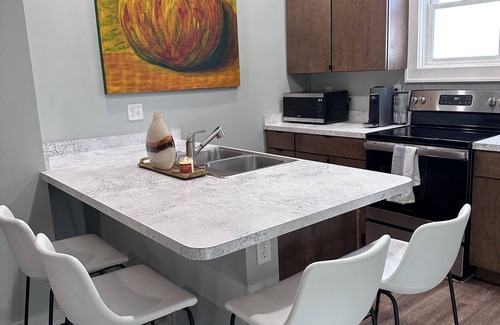 Oskaloosa House | Three bedroom townhome, blocks from idyllic downtown