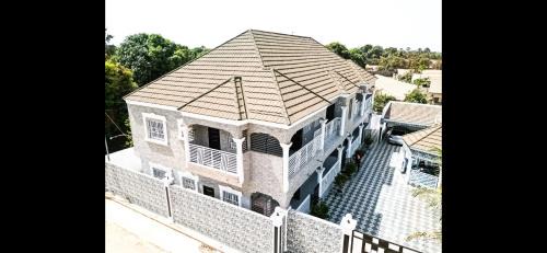 Gunjur Apartment | Tile House Apartments Gunjur Kolkoch