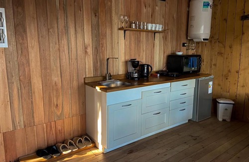 Peninsula San Pedro Cabin | Tiny house meters away from lake nahuel huapi. Access to the beach from the house.