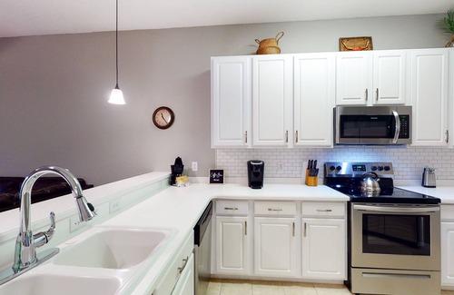 Bahama Bay Condo | Tommy Bahama-style condo with a lovely lanai and resort amenities