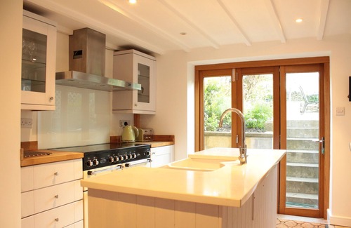 Longborough House | Traditional Cotswold stone cottage with wonderful views and log burning fires