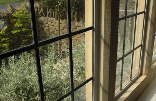 Longborough House | Traditional Cotswold stone cottage with wonderful views and log burning fires