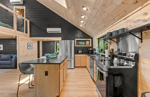 Rogers Cabin | Treetop Modern Cabin with Hot Tub, Creek View