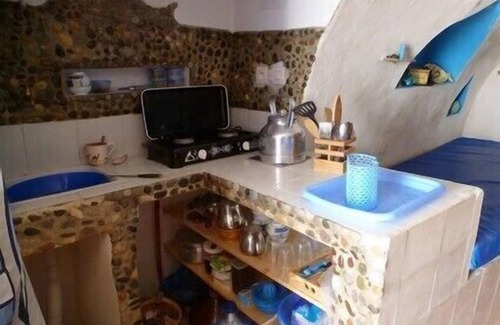 Tnine Aglou Cabin | Troglodyte dwelling fisherman facing the sea on sandy beach